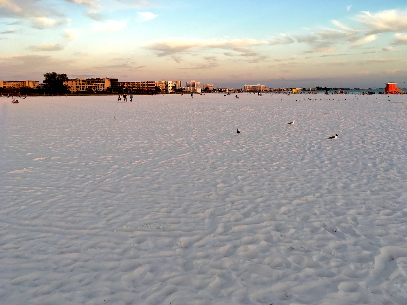 Wide quartz sand at Siesta Beach on Siesta Key at sunset